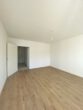 Renovierte 1-Zimmer Wohnung mit sonnigem Balkon! - Wohnbereich